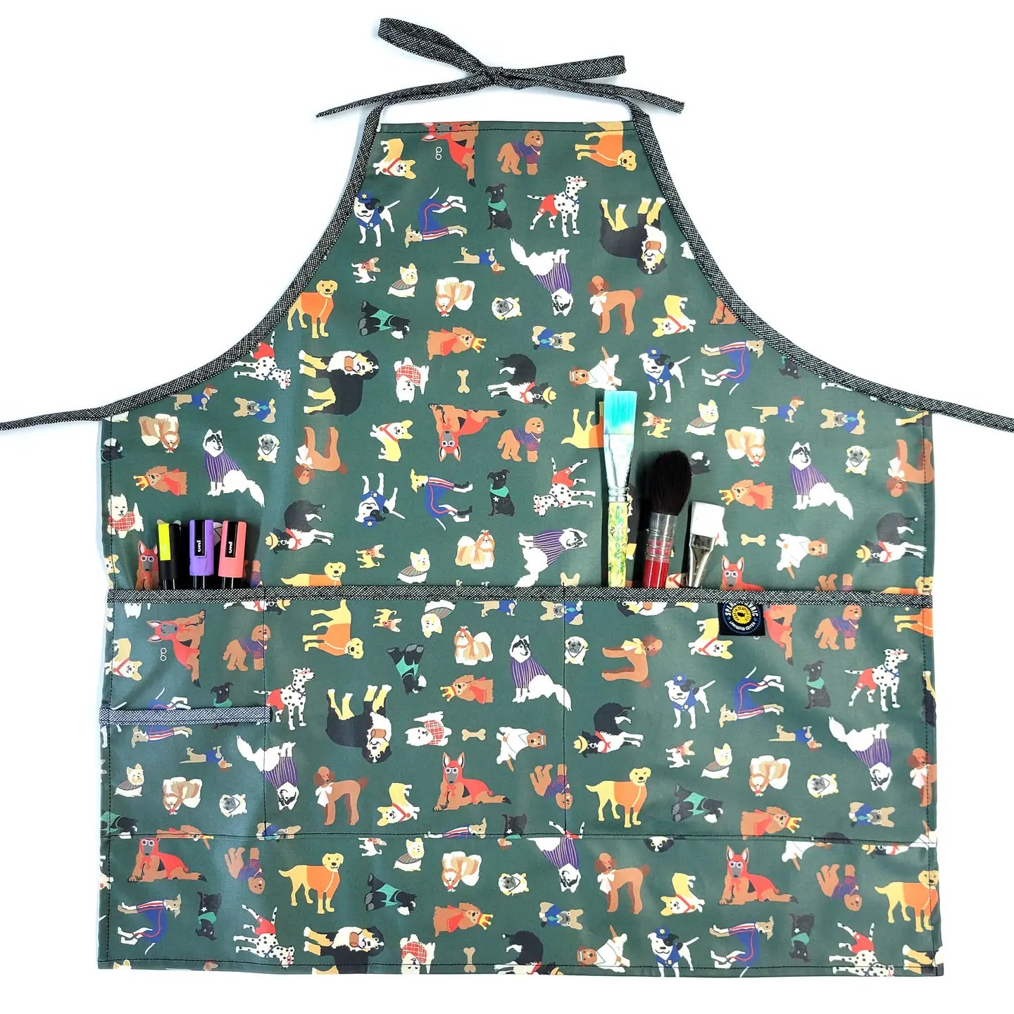 Full Apron in Laminated Cotton, Yard Dogs in Green