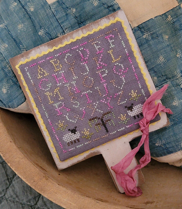 Holiday Hornbook: Easter Cross Stitch by Thread Milk Designs - Paper Pattern